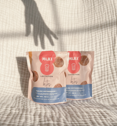 majka_p1 Influencer image of the shadow of a hand reaching down into the bag of Majka Lactation Bites