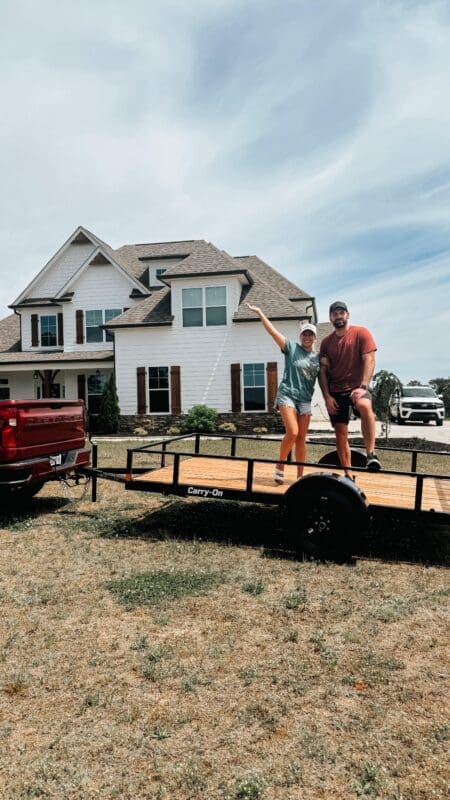 couple standing on trailer