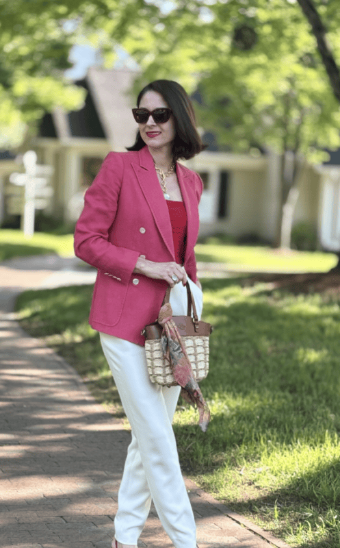 lady with purse on sidewalk