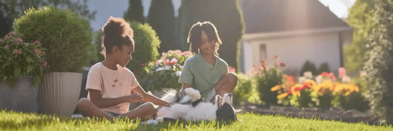 kids in yard with dog