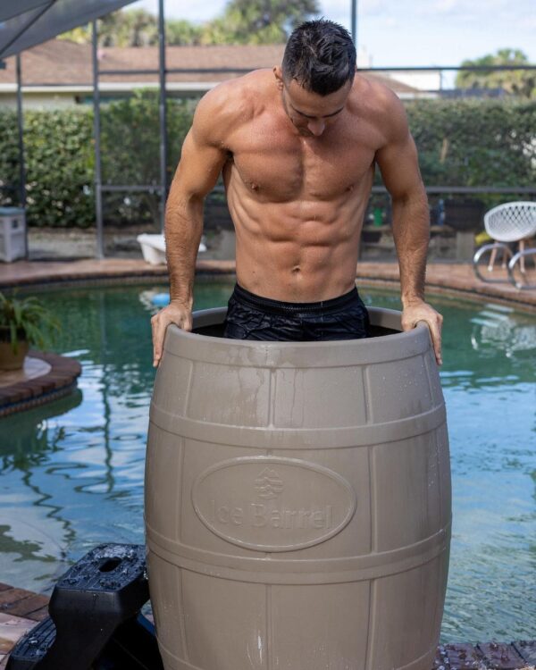 man getting in barrel