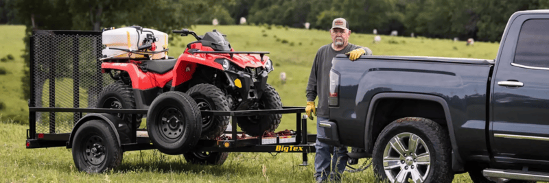 man hauling trailer