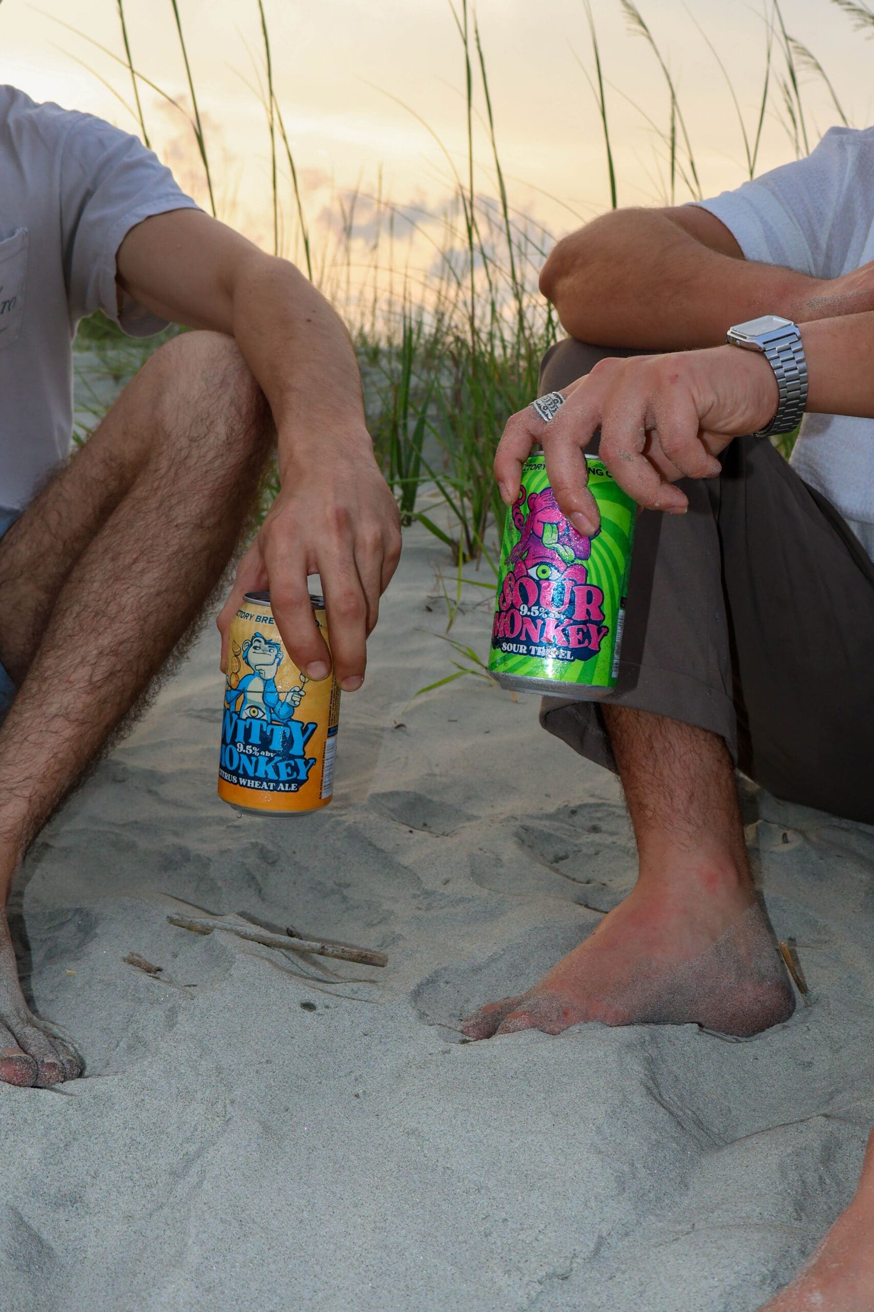 guys drinking beer on the beach