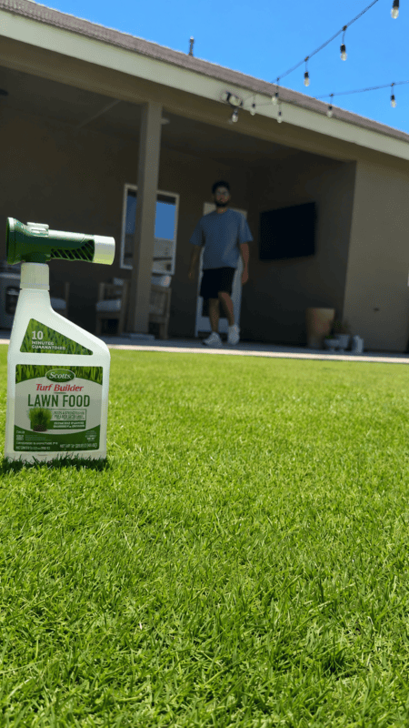 Person spraying yard products