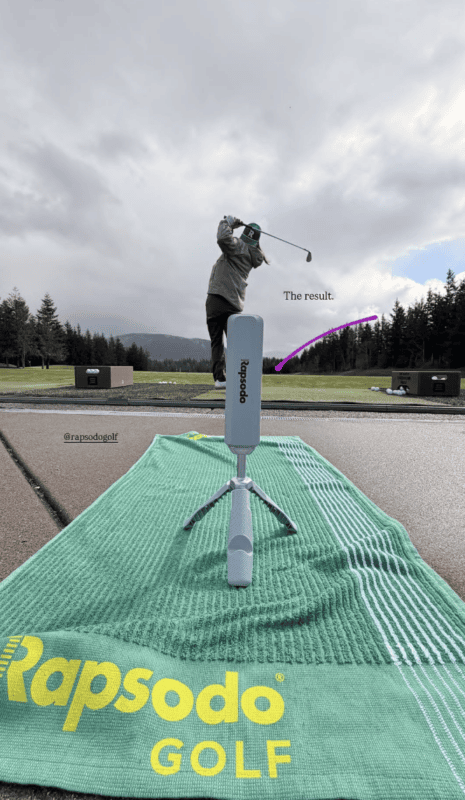 person swinging golf clubs