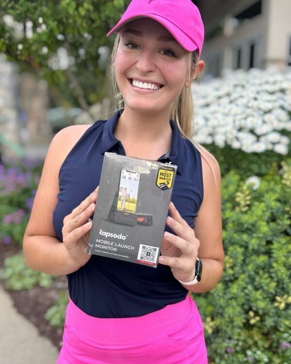girl holding rapsodo box