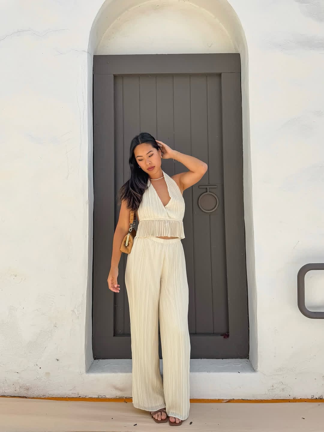 girl posing in front of door